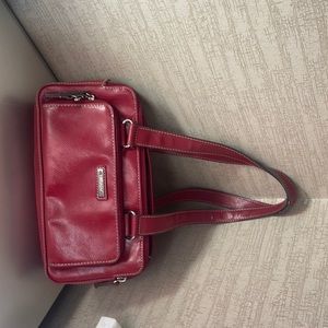 a purse, red, leather brand- “Villager”